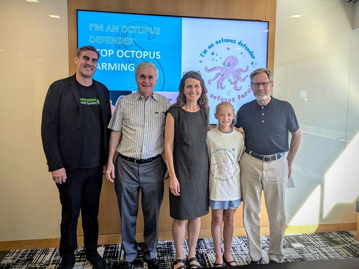 Ben Williamson and Lily Niederhofer pose with U.S. legislators in Oregon.