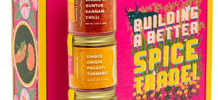 (Credit: Diaspora Co.) three spice jars stacked vertically to the left of a pink gift box