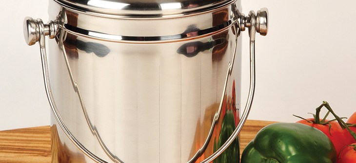 (Credit: Lehmans) Silver pail with lid on white background. Bell pepper and carrot sit to the right hand side of the frame