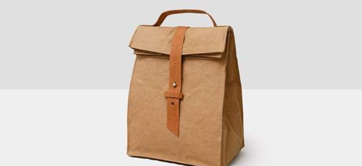 (Credit: Out of the Woods) Brown lunch bag with faux leather strap sits on white background