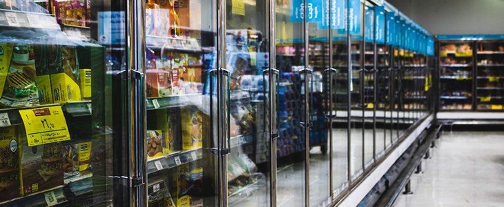 empty freezer section in grocery store