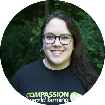 Amanda Richard smiling at the camera and wearing a black Compassion in World Farming t-shirt