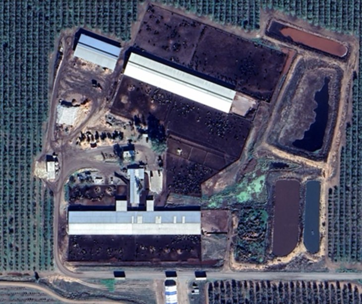 A screenshot of an aerial view of a Northern California feedlot for cattle.