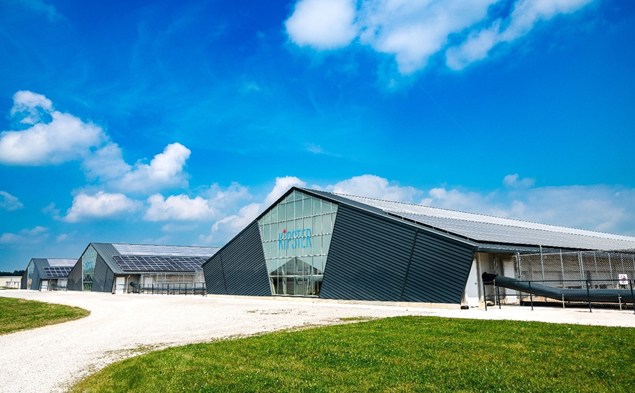 Outside view of Kipster chicken farm on a summer day.